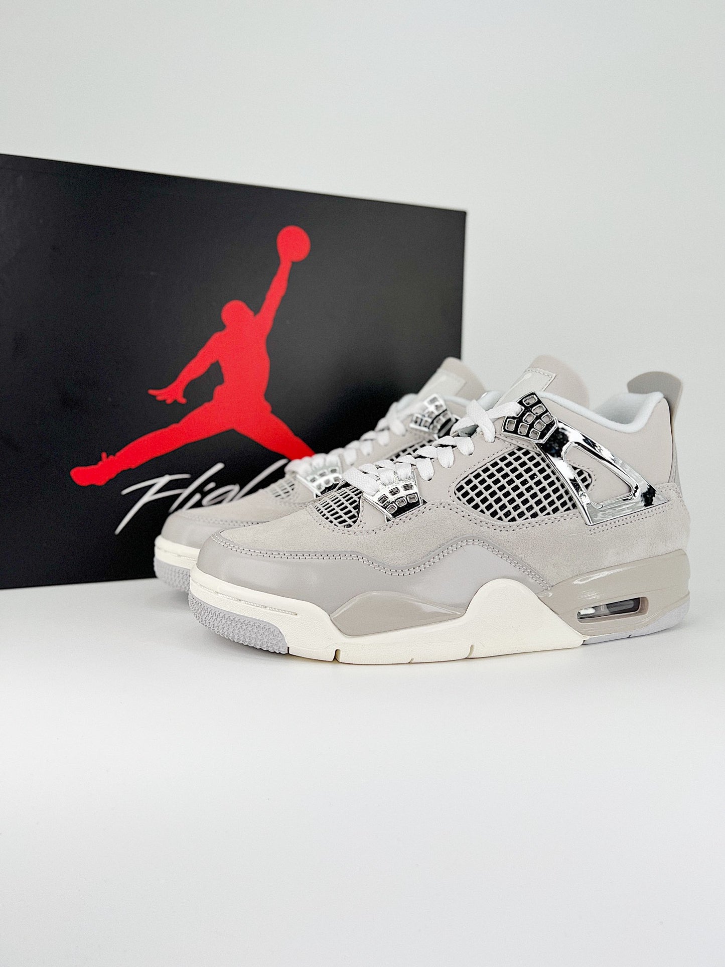 Jordan 4 Retro Frozen Moments